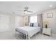 Comfortable bedroom with ample natural light and modern ceiling fan at 1712 Azalea Ct # A, Oldsmar, FL 34677