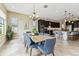 Open dining area adjoining the kitchen, perfect for Gathering meals at 17914 Howsmoor Pl, Lutz, FL 33559