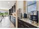 Kitchen features granite counters, stainless steel appliances, and plenty of counter space at 17914 Howsmoor Pl, Lutz, FL 33559
