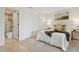 Comfortable bedroom with neutral tones and ensuite bathroom featuring stand up shower at 1960 Kansas Ne Ave, St Petersburg, FL 33703