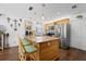 Well-equipped kitchen featuring stainless steel appliances, granite counters, and ample cabinet space at 1983 Seton Dr, Clearwater, FL 33763