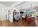 Comfortable living area with hardwood floors, bright lighting and easy access to the outdoor patio at 1983 Seton Dr, Clearwater, FL 33763