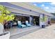 Covered patio features comfortable seating, creating a relaxing outdoor living space at 1983 Seton Dr, Clearwater, FL 33763