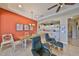 Living area with view into kitchen, showcasing the open floor plan, eat in bar and natural light at 2239 Sifield Greens Way # 84, Sun City Center, FL 33573