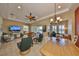 Open living room and dining area with water views at 2239 Sifield Greens Way # 84, Sun City Center, FL 33573