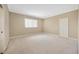 Bedroom with beige walls and carpet at 23320 Dinhurst Ct, Land O Lakes, FL 34639