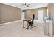 Large home office featuring neutral walls, carpet flooring, and a desk for a comfortable and productive workspace at 23320 Dinhurst Ct, Land O Lakes, FL 34639