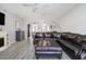 Living room featuring modern flooring, ceiling fan, and a large leather sectional at 2725 Terra Ceia Bay Blvd # 104, Palmetto, FL 34221