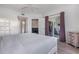 Bright main bedroom with ensuite access and sliding glass doors to a private lanai at 2725 Terra Ceia Bay Blvd # 104, Palmetto, FL 34221