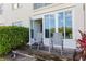 Peaceful patio space with chairs, perfect for enjoying morning coffee or evening relaxation at 2725 Terra Ceia Bay Blvd # 104, Palmetto, FL 34221