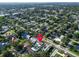 An elevated view displays this neighborhood's single-Gathering homes, each with its own yard, driveway, and tree-lined streets at 2897 Rosery Ne Rd, Largo, FL 33771