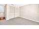 Carpeted bedroom with sliding closet doors and ample space. Ready for move-in! at 2897 Rosery Ne Rd, Largo, FL 33771