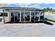 Screened-in patio and bar area next to sparkling pool. Great for entertaining outdoors! at 2897 Rosery Ne Rd, Largo, FL 33771