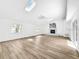 Large living room with wood floors, skylights, fireplace and bright, airy atmosphere at 290 13Th N Ave, Safety Harbor, FL 34695