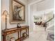 A welcoming foyer with stylish console table and elegant artwork, creating a sophisticated entrance at 3042 Wentworth Way, Tarpon Springs, FL 34688
