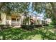 The spacious backyard has a screened pool and patio area for outdoor enjoyment at 3042 Wentworth Way, Tarpon Springs, FL 34688