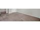 Neutral carpeted bedroom with neutral wall paint at 30732 Summer Sun Loop, Wesley Chapel, FL 33545