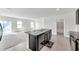 Open concept kitchen with large island and stainless steel appliances at 30732 Summer Sun Loop, Wesley Chapel, FL 33545