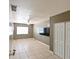 Spacious room with neutral walls, tile flooring, and a large window with a view at 3303 W Idlewild Ave, Tampa, FL 33614