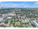This high-angle shows the property's location with city views and lush trees at 3807 W Cleveland St, Tampa, FL 33609