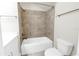 The bathroom offers a shower-tub combination with modern tile at 3807 W Cleveland St, Tampa, FL 33609