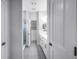 Bright bathroom with double vanity, modern fixtures, and glass-enclosed shower, offering a spa-like experience at 3807 W Cleveland St, Tampa, FL 33609