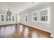Sunlit living room with hardwood floors and lots of windows at 3807 W Cleveland St, Tampa, FL 33609