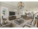 Spacious living room featuring an open floor plan with modern furnishings and elegant decor, perfect for entertaining at 3807 W Cleveland St, Tampa, FL 33609