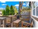 Cozy outdoor seating area on a wooden deck with stylish furniture, perfect for relaxing at 403 E North St, Tampa, FL 33604