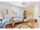 Inviting bedroom with a futon, hardwood floors, and decorative accents at 403 E North St, Tampa, FL 33604