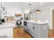 Lovely kitchen featuring stainless steel appliances and a breakfast bar island with seating at 403 E North St, Tampa, FL 33604