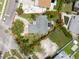An aerial view outlines the property, showing the house, driveway, and landscaping at 4101 Shore Acres Ne Blvd, St Petersburg, FL 33703