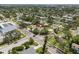 An aerial view shows the property's proximity to nearby buildings and roads at 4101 Shore Acres Ne Blvd, St Petersburg, FL 33703