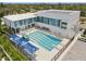 A top-down view displays the community school with a large pool at 4101 Shore Acres Ne Blvd, St Petersburg, FL 33703