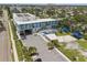 A top-down view shows a nearby community school with playground and parking at 4101 Shore Acres Ne Blvd, St Petersburg, FL 33703