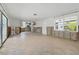 Open living space includes the kitchen, exposed framing, and tile floors, ready for customization at 4101 Shore Acres Ne Blvd, St Petersburg, FL 33703
