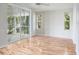 Spacious bedroom with hardwood floors and large sliding glass doors at 4167 Seton Cir, Palm Harbor, FL 34683