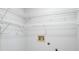 Walk-in closet with wire shelving and a white wall at 4167 Seton Cir, Palm Harbor, FL 34683