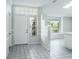 Open entryway with tile flooring leading into the living area at 4167 Seton Cir, Palm Harbor, FL 34683