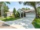 Well-maintained home featuring a spacious driveway and attached two-car garage at 4167 Seton Cir, Palm Harbor, FL 34683