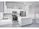Spacious kitchen with island, stainless appliances, and tiled floor at 4167 Seton Cir, Palm Harbor, FL 34683