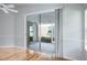Large sliding glass doors leading to the screened patio at 4167 Seton Cir, Palm Harbor, FL 34683