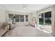 Bright bedroom with a bay window overlooking the pool, complete with a cute rocking horse at 4615 Shark Dr, Bradenton, FL 34208