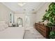 Spacious bedroom has wood floors, a large mirror, and plenty of closet space at 4615 Shark Dr, Bradenton, FL 34208
