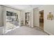 Charming bedroom with easy access to an outdoor cooking area and a peek at the kitchen at 4615 Shark Dr, Bradenton, FL 34208