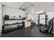Organized garage space with workout equipment and storage solutions for an active lifestyle at 4615 Shark Dr, Bradenton, FL 34208