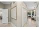 Hallway leads to bedroom and features a wall art piece and closet at 4615 Shark Dr, Bradenton, FL 34208