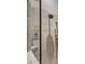 Modern tiled shower featuring a rainfall shower head and handheld shower at 4615 Shark Dr, Bradenton, FL 34208