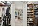Spacious walk-in closet with custom shelving and ample storage space at 4615 Shark Dr, Bradenton, FL 34208