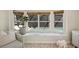 Inviting window seat with a view of the pool, creating a cozy reading nook at 4615 Shark Dr, Bradenton, FL 34208